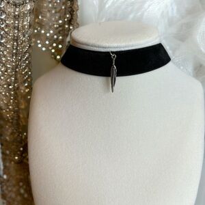 Black Velvet Choker With Silver Tone Feather Embellishment and Charm. 3/4”W 14”L